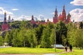 Landscape of Moscow in summer, Russia. People walk on path in modern Zaryadye Park near old Moscow Kremlin Royalty Free Stock Photo