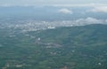 Landscape of mountain and ciy through from window plane Royalty Free Stock Photo