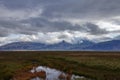 Landscape with mountain in clouds near Hofn village