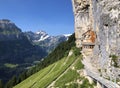 Landscape of the mountain Ebenalp and the mountain restaurant under the Ascher cliff in the Appenzellerland region Royalty Free Stock Photo