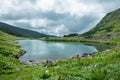 Landscape with mountain lake under the beautiful clouds Royalty Free Stock Photo