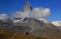 A landscape with a mountain Matterhorn view partially covered by clouds on a mountain Gornergrat, Switzerland