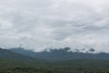 Landscape of mountain with misty rain