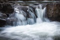 Landscape of mountain river in sunshine. View of the stony rapids. Royalty Free Stock Photo