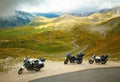 Landscape with mountain road and three motorbikes Royalty Free Stock Photo