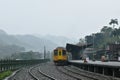 Landscape of mountain and train parking at Dahua train station