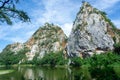 Landscape Mountain View with water reflection at Khao ngoo or snake stone mountain park with blue sky Royalty Free Stock Photo