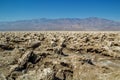 Landscape, mountains, blue sky - Devil`s golf course, Death Valley National Park Royalty Free Stock Photo