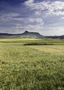 Landscape with mountains and clouds wheat Royalty Free Stock Photo