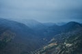 Landscape of mountains with cloudy sky and fog on a cloudy day. Autumn rainy day Royalty Free Stock Photo