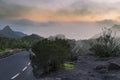 Landscape with mountains covered with clouds