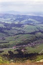 Landscape of a mountains with fir-tree and green valley Royalty Free Stock Photo