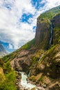 Landscape Mountains Hiking Himalayas.Beautiful View Waterfalls End Summer Season Background.Green Threes Cloudy Blue Sky