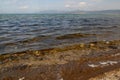 Landscape with mountains and Iznik Lake against a blue sky with clouds in the city of Iznik, Turkey