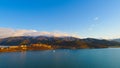 Landscape of mountains and lake under sunset, lakeside town, beautiful landscape