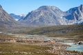 Landscape of mountains and meltwater river at Camp Frieda on the Disko Bay coast, Greenland