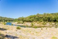 Landscape with Mountains river above the famous Pont du Gard, France Royalty Free Stock Photo