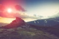Landscape in the mountains:snowy tops and spring valleys at sunlight. Royalty Free Stock Photo