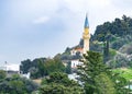 Landscape with muslim village with a mosque on the background of the mountain and sky. North Cyprus nature Royalty Free Stock Photo