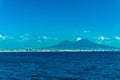 Landscape of Naples with the Vesuvio mountain from the blue mediterranean sea Royalty Free Stock Photo