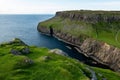 Landscape of Neist Point cliff and a short rocky bay at Isle of Skye, Scotland Royalty Free Stock Photo