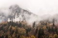 landscape with Neuschwanstein castle and mountains in the background, Hohenschwangau, Bavaria, Germany Royalty Free Stock Photo