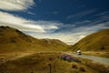 Landscape New Zealand - South Island - landscape near Southern Alps - road between mountains, blue sky with clouds Royalty Free Stock Photo