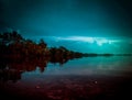 Landscape of night sky with many stars and cloudy above river area Royalty Free Stock Photo