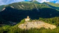 Landscape with old castle in sunset light, Switzerland. Village in Swiss Alpine terrain Royalty Free Stock Photo