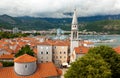 Landscape of old city with red roofs and high tower Royalty Free Stock Photo