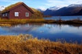Landscape with old house and lake Royalty Free Stock Photo