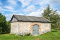 Landscape with old rustic stone barn