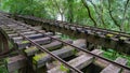 The old train tracks railway railroad bridge in forest background. Royalty Free Stock Photo