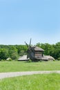 Landscape with old wooden windmills Royalty Free Stock Photo