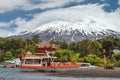 Landscape of the Osorno volcano and pier to visit the Todos los Santos lake All Saints lake, in the lake district near Puerto