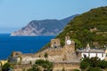 Landscape panorama with castle of Riomaggiore, historic building located in the upper part of the historic center of Riomaggiore,