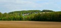 Landscape, panorama. Field, arable land, sky. On the edges of the forest are fields with green trees, Spring. Sunny day. Royalty Free Stock Photo