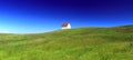 Gulf Islands National Park, Saturna Island, Rolling Grasslands with Old Fog Station at East Point, British Columbia, Canada Royalty Free Stock Photo