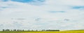 landscape panorama of rural canola farm fields Royalty Free Stock Photo