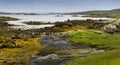 Landscape in panoramic format of the low tide coast of Golam Head. Royalty Free Stock Photo