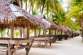 Landscape of paradise tropical island with palms and white sand beach Royalty Free Stock Photo