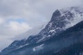 Landscape with peaks engulfed in clouds and misty forests Royalty Free Stock Photo