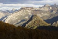 Landscape of Peaks of Europe national park at sunset with bright sunset sky and autumn forest with colorful yellow and orange Royalty Free Stock Photo