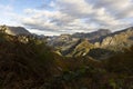 Landscape of Peaks of Europe national park at sunset with bright sunset sky and autumn forest with colorful yellow and orange Royalty Free Stock Photo