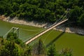 Landscape with pedestrian bridge at river Uvac gorge Royalty Free Stock Photo