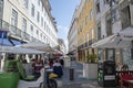 Landscape of people eating on Blue Street in Lisbon Portugal