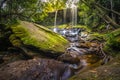 The landscape photo, beautiful rainforest waterfall in deep forest at Phu Kradueng National Park Royalty Free Stock Photo