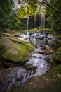 The landscape photo, beautiful rainforest waterfall in deep forest at Phu Kradueng National Park Royalty Free Stock Photo