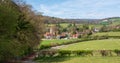 Landscape photo of the characterful village of Fingest in the Chiltern Hills, surrounded by farming land.