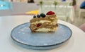 Pavlova and cake dessert on a plate